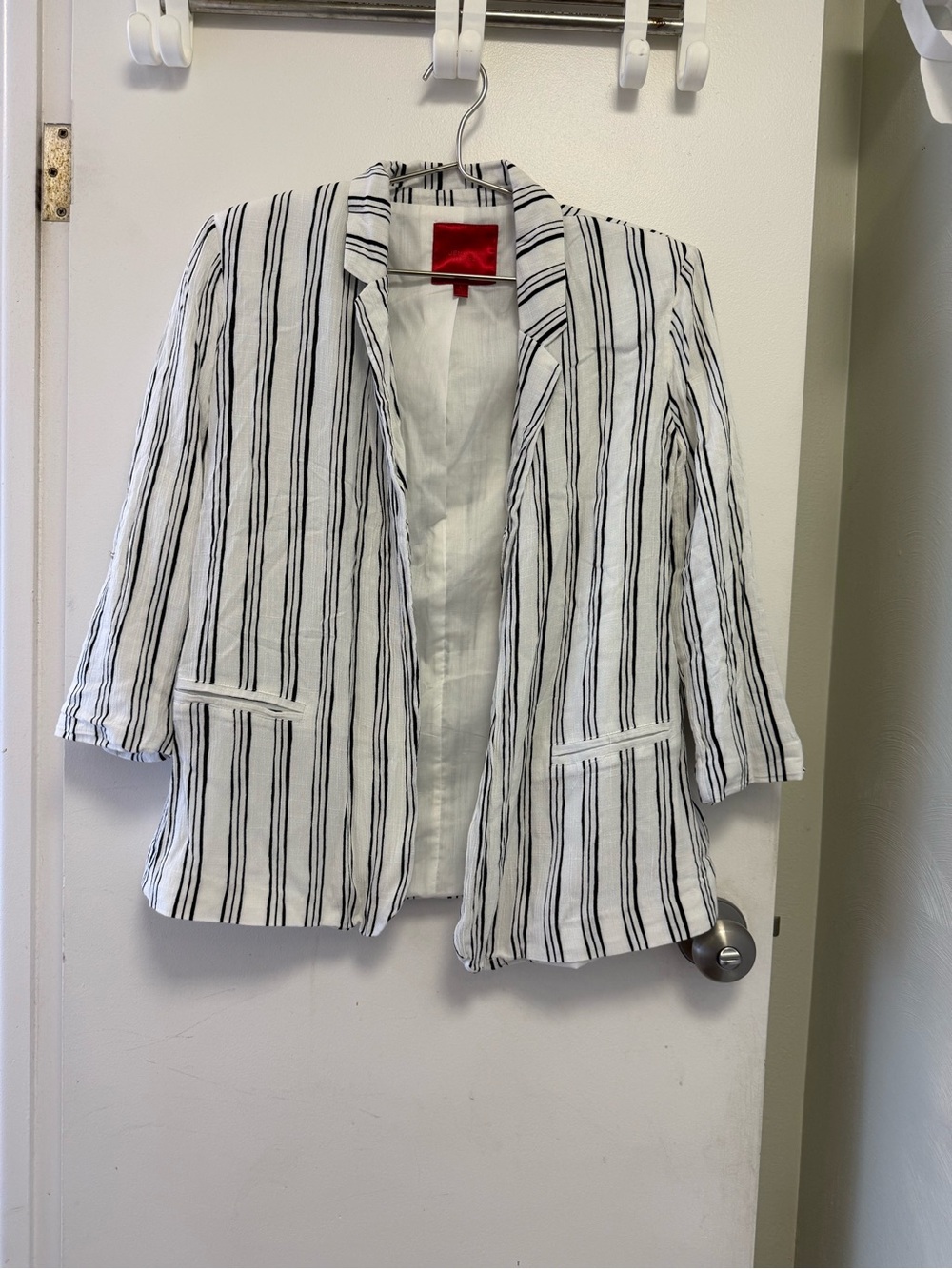 Jennifer Lopez White Blazer with Black Stripes